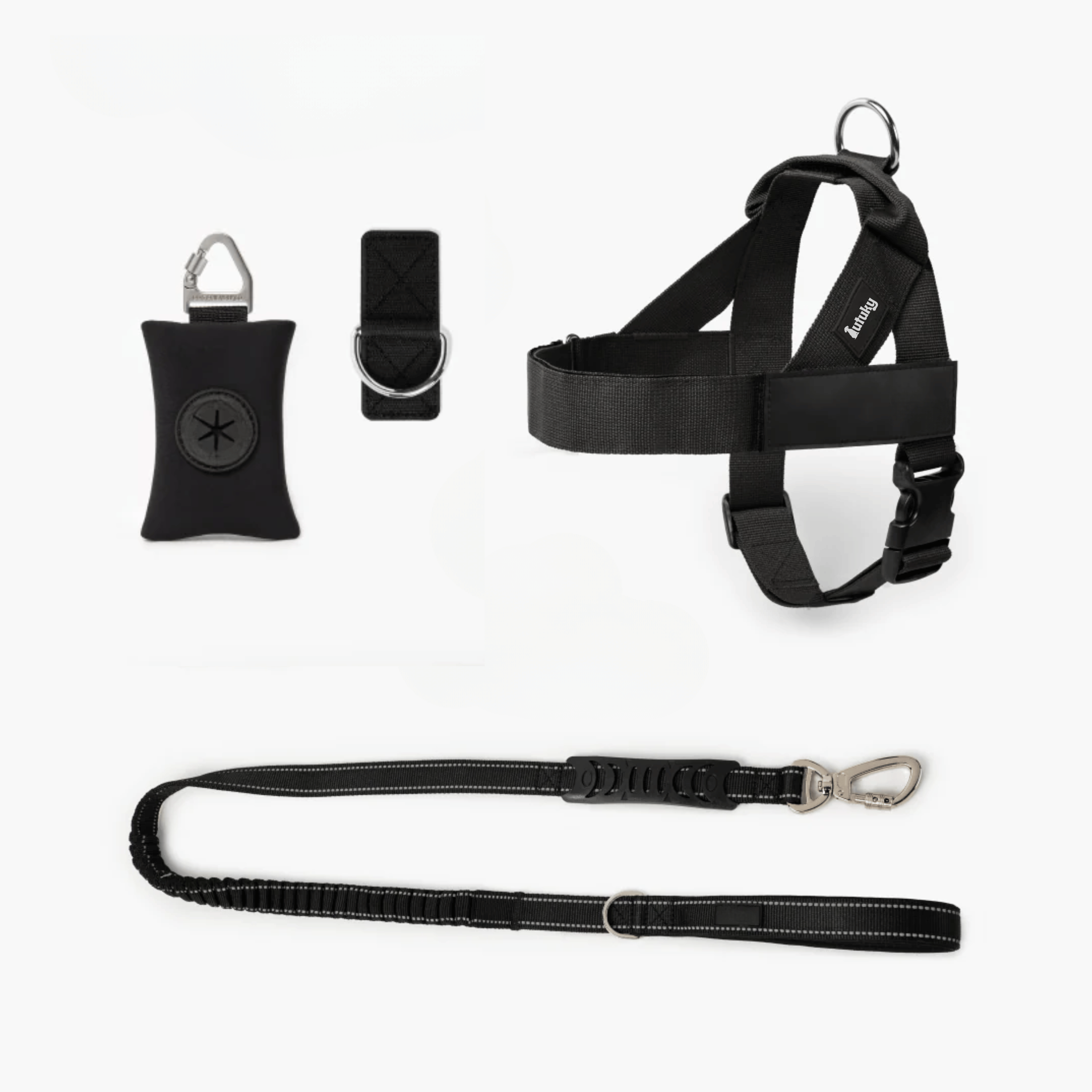 Black dog harness, leash, clicker on a white background