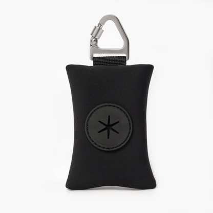 Compact dog poop bag (black) holder with carabiner, ideal for clean and stress-free walks.