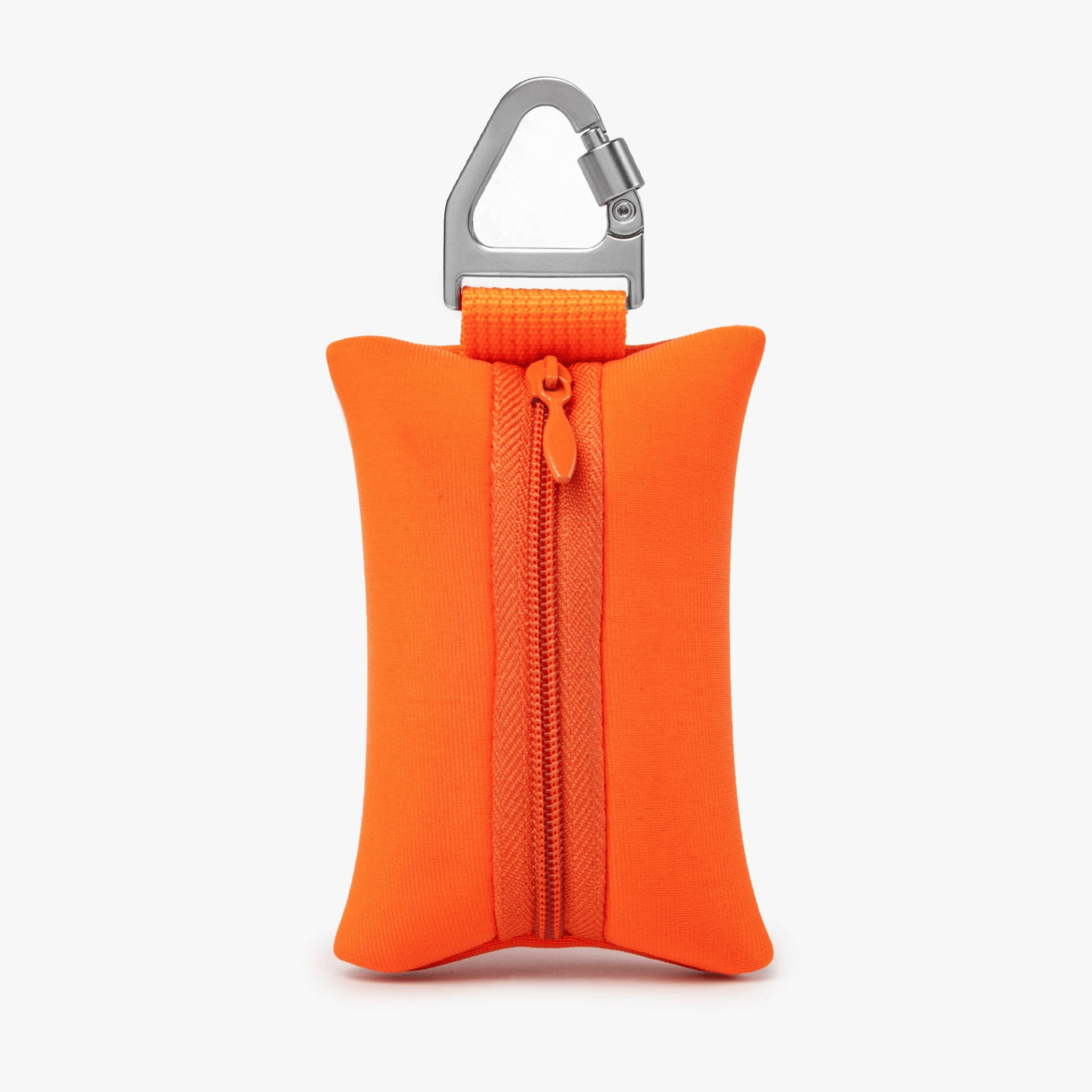 Compact orange dog poop bag holder with carabiner, ideal for clean and stress-free walks.
