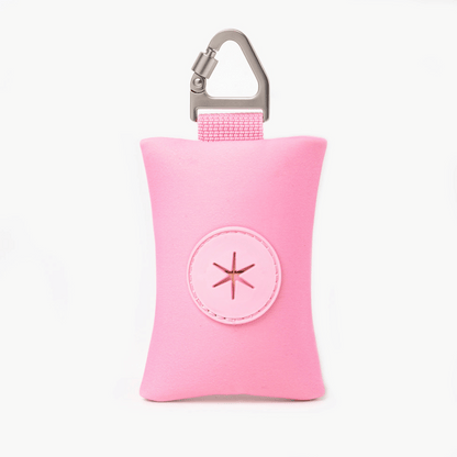Compact Pink dog poop bag holder with carabiner, ideal for clean and stress-free walks.