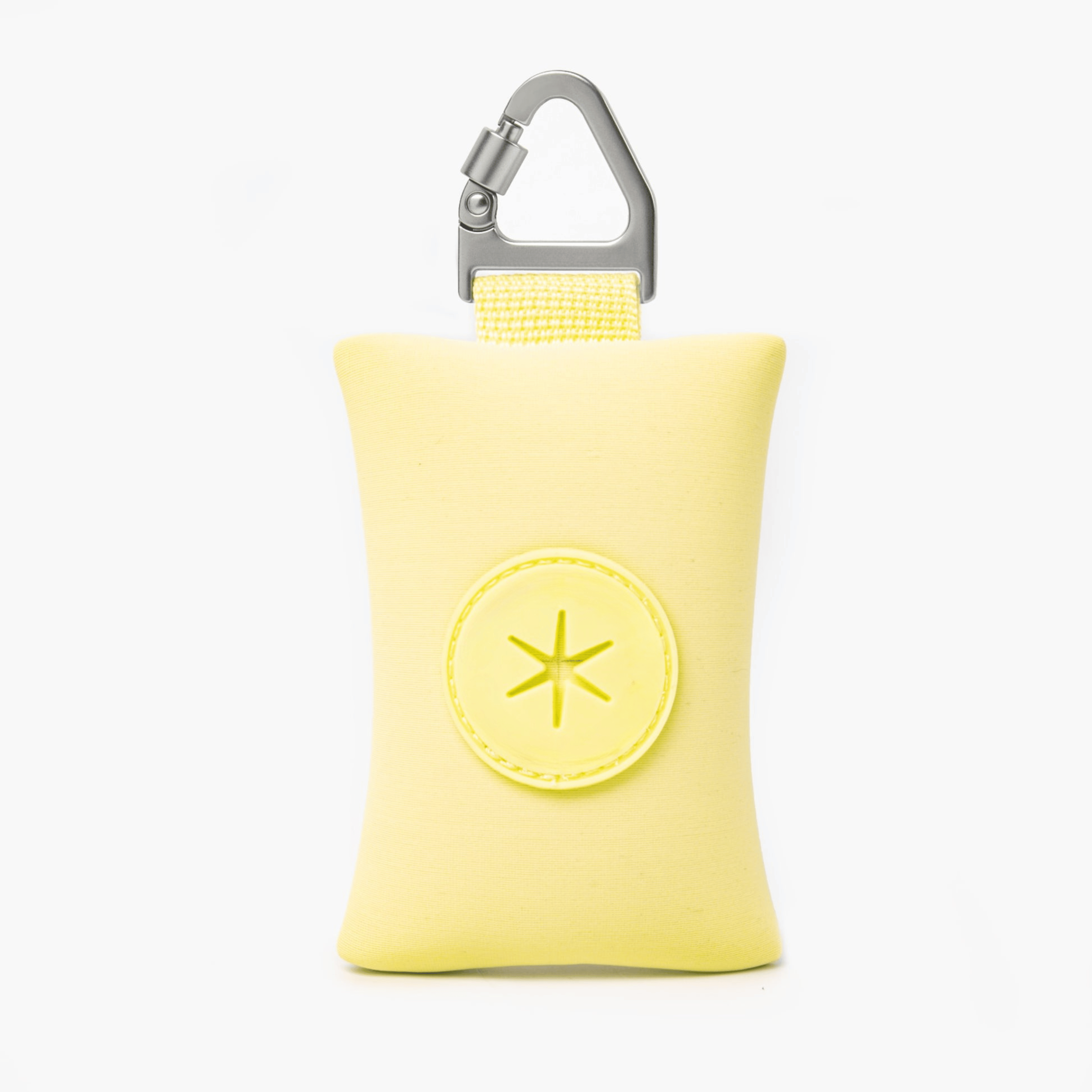 Compact Yellow dog poop bag holder with carabiner, ideal for clean and stress-free walks.
