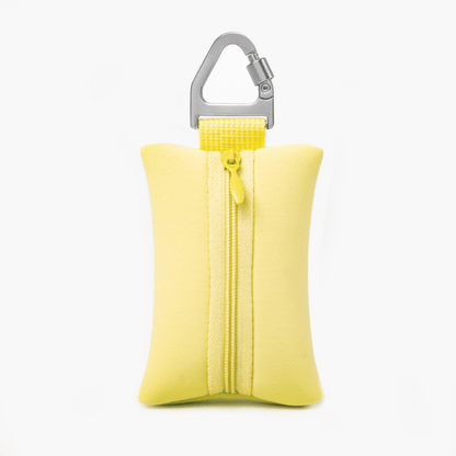 Compact Yellow dog poop bag holder with carabiner, ideal for clean and stress-free walks.
