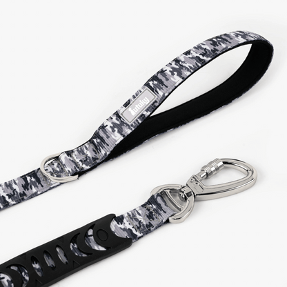 Dog leash with camouflage pattern on a white background