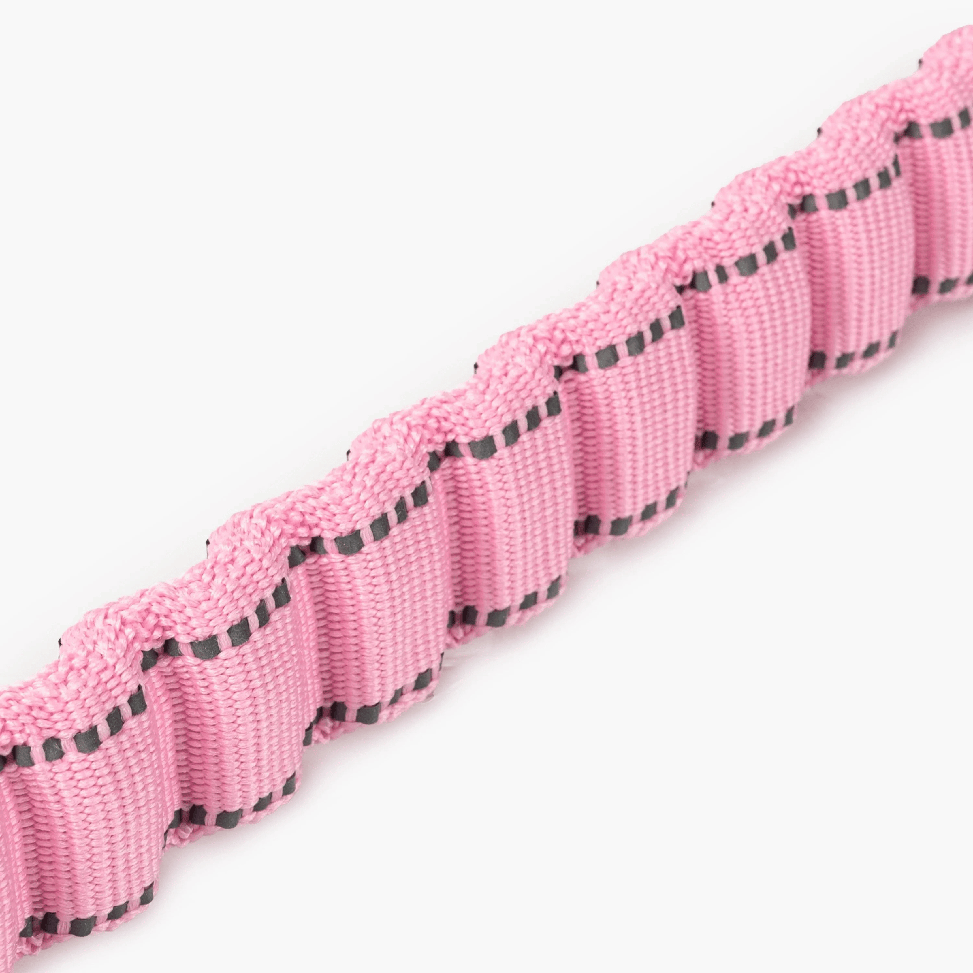 Pink and black camouflage patterned lanyard with a metal clip on a white background