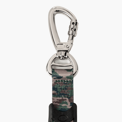Camo-patterned dog leash with a metal clip on a white background