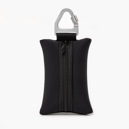Compact black dog poop bag holder with carabiner, ideal for clean and stress-free walks.